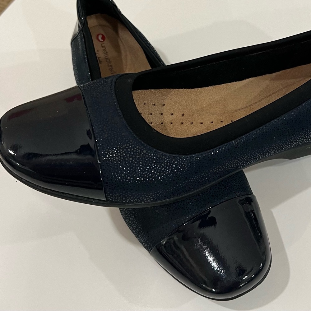 Clarks leather uppers. Navy Blue. Slight wedge. Size 9